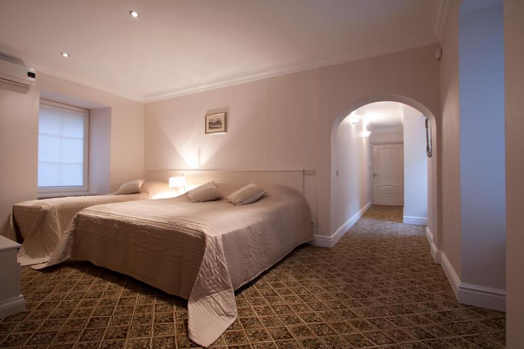 Aparthotel Real House Vilna Habitación foto