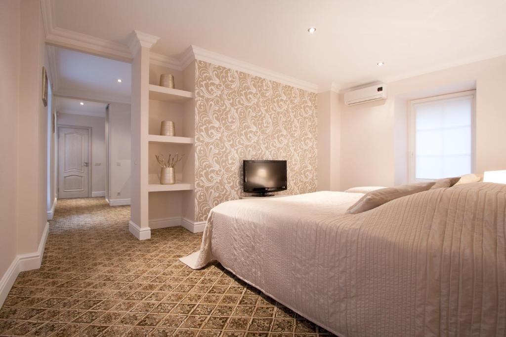 Aparthotel Real House Vilna Habitación foto