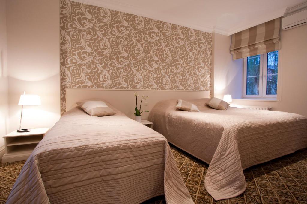 Aparthotel Real House Vilna Habitación foto