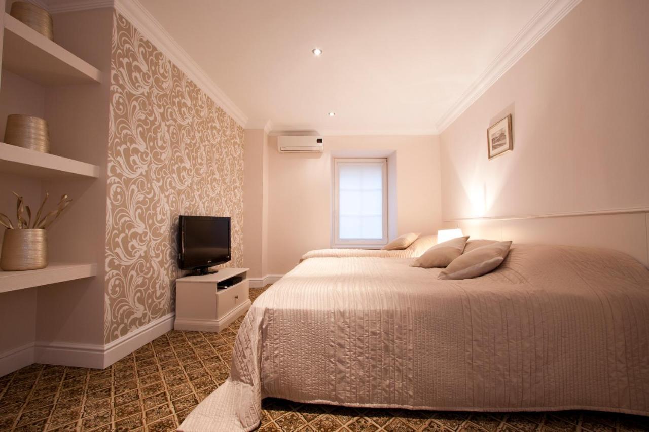 Aparthotel Real House Vilna Habitación foto