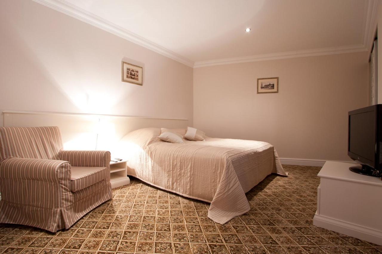 Aparthotel Real House Vilna Habitación foto